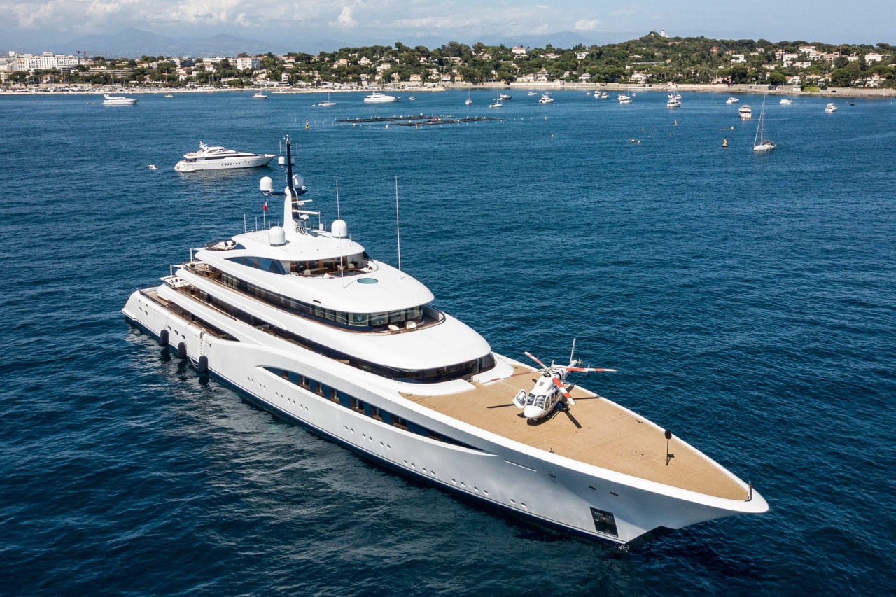 big yacht with helicopter